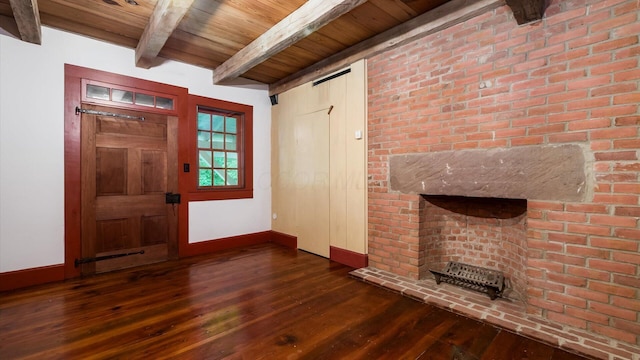24000 State Route 180, Rockbridge, OH 43149 - unfurnished living room with dark wood-style floors and a wooden ceiling with exposed beams