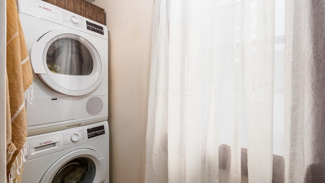 24000 State Route 180, Rockbridge, OH 43149 - washroom featuring stacked washer / dryer