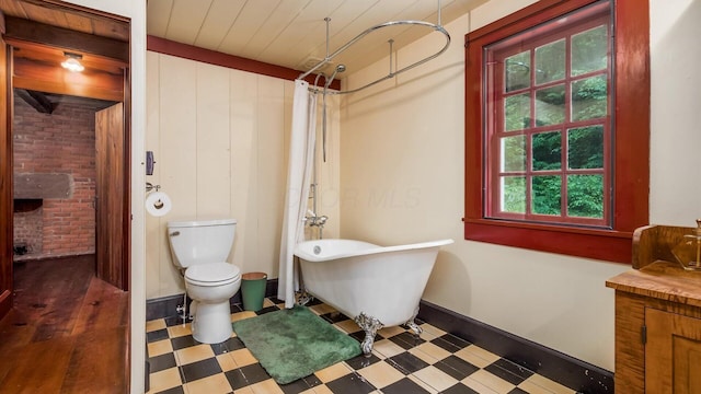 24000 State Route 180, Rockbridge, OH 43149 - full bath with a freestanding bath, tile patterned floors, curtained shower, and vanity