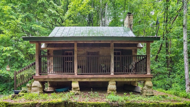 24000 State Route 180, Rockbridge, OH 43149 - wooden terrace with a forest view