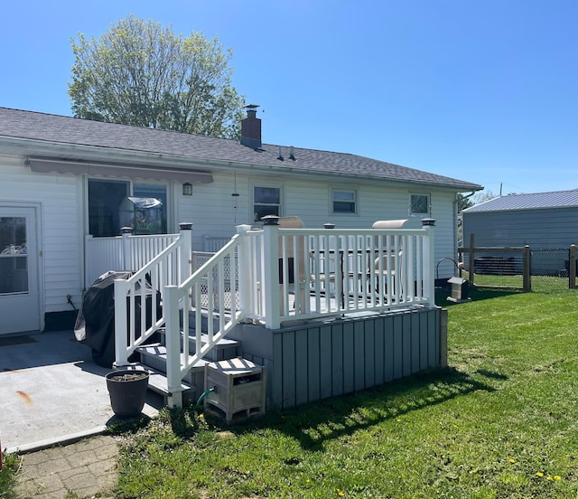 568 Swackhammer Rd, Circleville, OH 43113 - rear view of property with a deck, a chimney, and roof with shingles