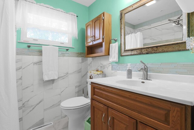 568 Swackhammer Rd, Circleville, OH 43113 - bathroom with vanity, marble finish floors, a shower with curtain, and tile walls