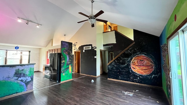 1080 Oxford Dr N, Pataskala, OH 43062 - unfurnished living room with rail lighting, a ceiling fan, wood finished floors, and high vaulted ceiling