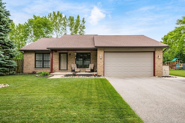 4051 Tamarack Ave, Grove City, OH 43123 - ranch-style home with driveway, brick siding, a garage, and roof with shingles