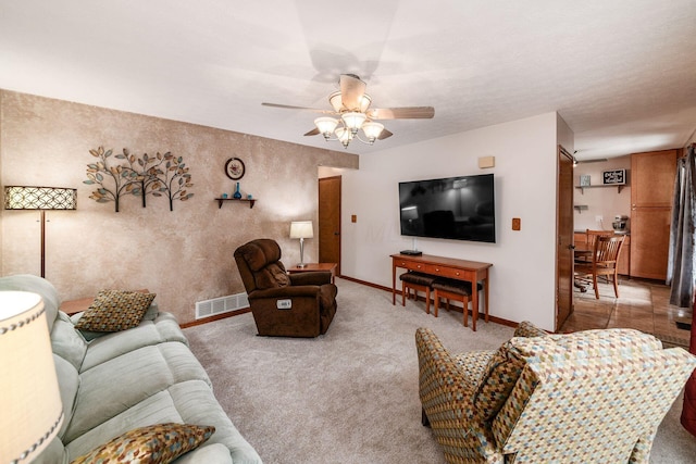 4051 Tamarack Ave, Grove City, OH 43123 - carpeted living room featuring a ceiling fan and baseboards
