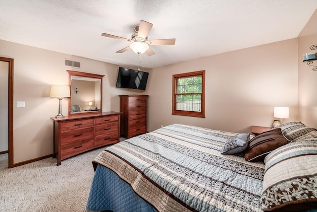 4051 Tamarack Ave, Grove City, OH 43123 - bedroom with light colored carpet and a ceiling fan