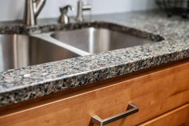 4051 Tamarack Ave, Grove City, OH 43123 - kitchen view of light stone countertops and brown cabinets