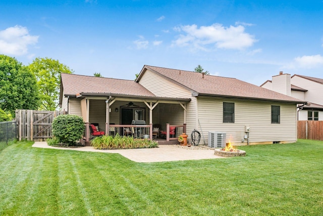 4051 Tamarack Ave, Grove City, OH 43123 - rear view of property with a fire pit, a patio, a fenced backyard, ceiling fan, and a gate