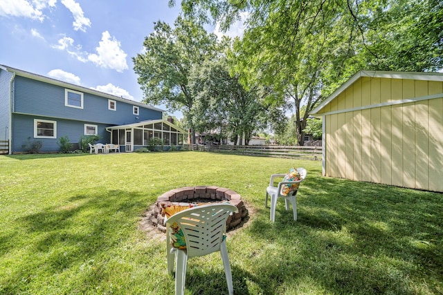 816 Coss Cir, Westerville, OH 43081 - view of yard featuring a sunroom and an outdoor fire pit