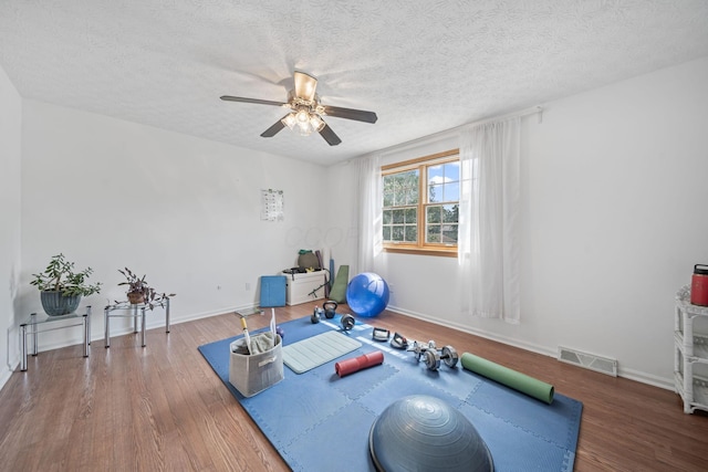 816 Coss Cir, Westerville, OH 43081 - exercise room with ceiling fan, wood finished floors, and a textured ceiling