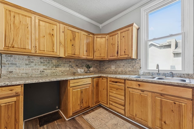 264 W High St, Mount Gilead, OH 43338 - kitchen featuring dark wood finished floors, tasteful backsplash, light countertops, a textured ceiling, and ornamental molding