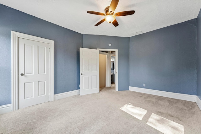 264 W High St, Mount Gilead, OH 43338 - unfurnished bedroom with carpet floors and ceiling fan