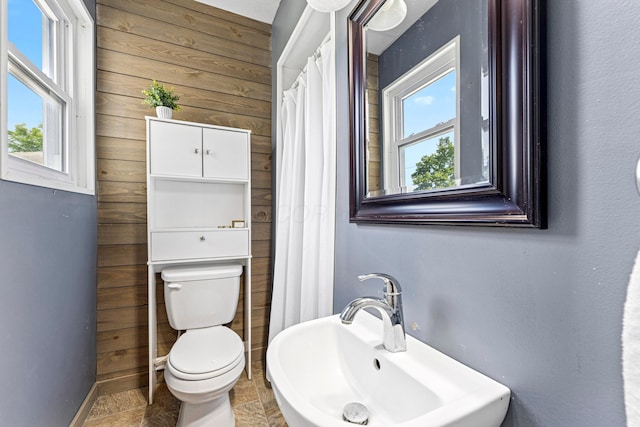 264 W High St, Mount Gilead, OH 43338 - full bathroom featuring healthy amount of natural light and stone finish flooring