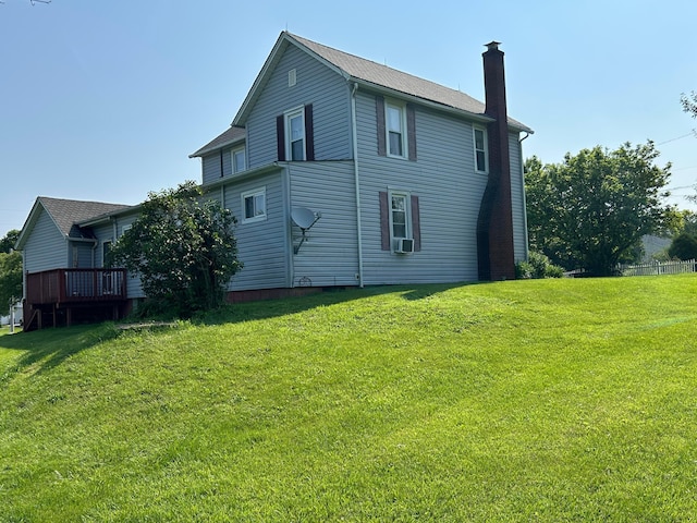 12317 State Route 188, Thornville, OH 43076 - back of house with a chimney, a yard, and a wooden deck