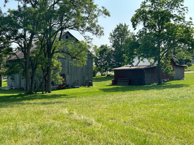12317 State Route 188, Thornville, OH 43076 - view of green lawn with an outbuilding and an outdoor structure