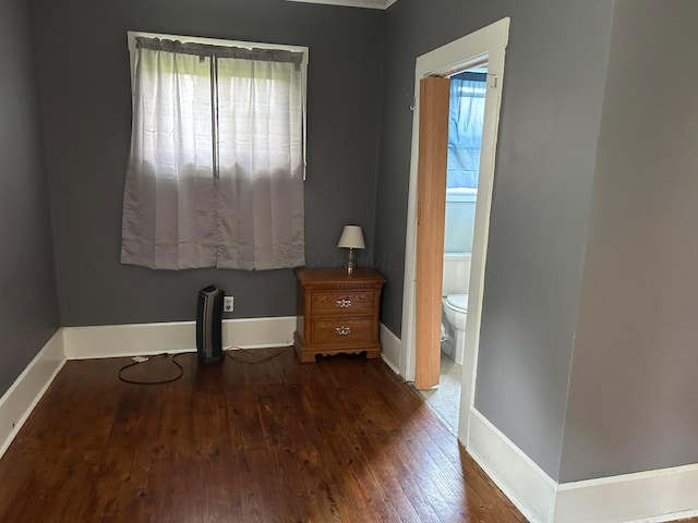 12317 State Route 188, Thornville, OH 43076 - unfurnished bedroom featuring dark wood-style floors and ensuite bathroom