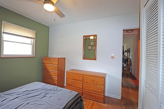 4792 Mcfadden Rd, Columbus, OH 43229 - bedroom featuring wood finished floors and a ceiling fan