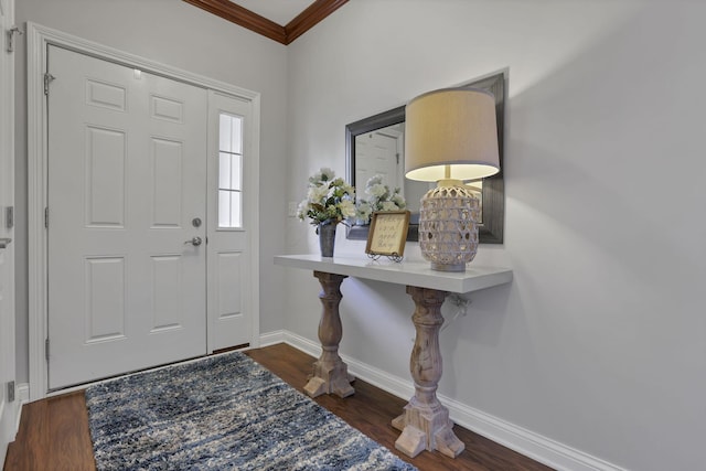 5685 Slater Rdg, Hilliard, OH 43026 - foyer entrance featuring ornamental molding and dark wood-style flooring