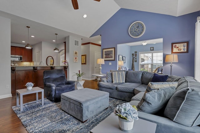 5685 Slater Rdg, Hilliard, OH 43026 - living area with a ceiling fan, dark wood finished floors, high vaulted ceiling, and recessed lighting