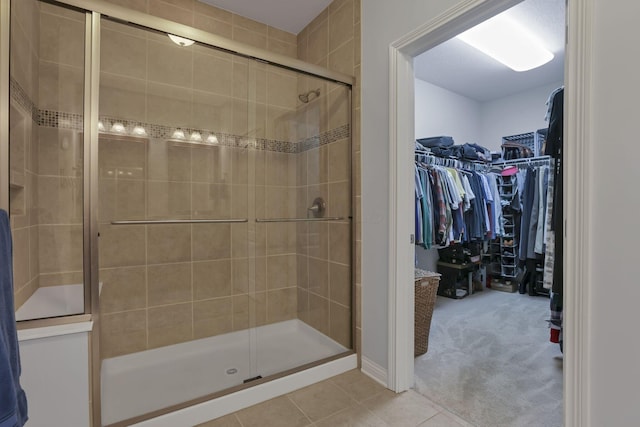 5685 Slater Rdg, Hilliard, OH 43026 - full bath with a stall shower, tile patterned flooring, and a walk in closet