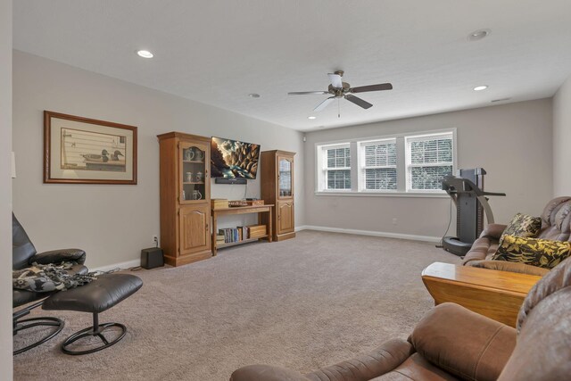 5685 Slater Rdg, Hilliard, OH 43026 - living room with light carpet, ceiling fan, and recessed lighting