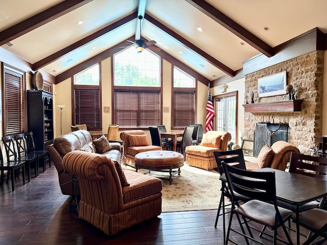 5685 Slater Rdg, Hilliard, OH 43026 - living room with ceiling fan, a stone fireplace, beam ceiling, healthy amount of natural light, and hardwood / wood-style floors