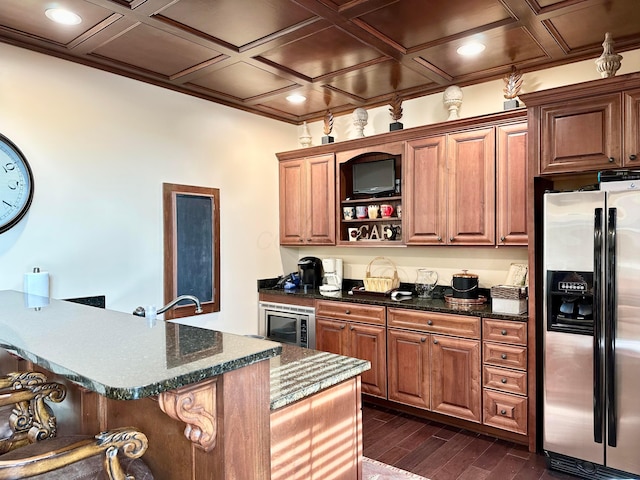 5685 Slater Rdg, Hilliard, OH 43026 - kitchen with stainless steel refrigerator with ice dispenser, dark wood finished floors, coffered ceiling, brown cabinets, and beverage cooler