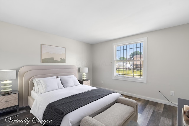 2045 Joyce Ave, Columbus, OH 43219 - bedroom featuring wood finished floors and baseboards