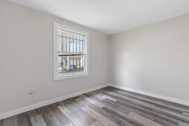 2045 Joyce Ave, Columbus, OH 43219 - unfurnished room featuring wood finished floors and baseboards