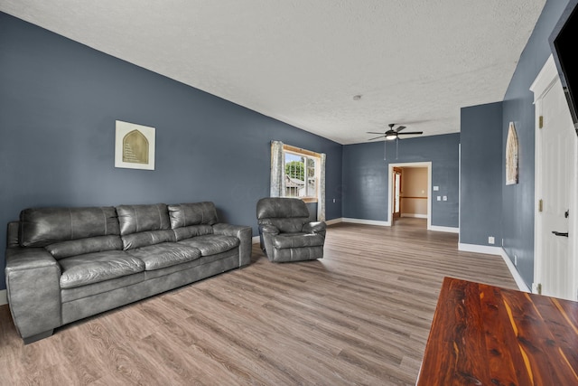972 Weiant Ave, Newark, OH 43055 - living area with a textured ceiling, a ceiling fan, and wood finished floors