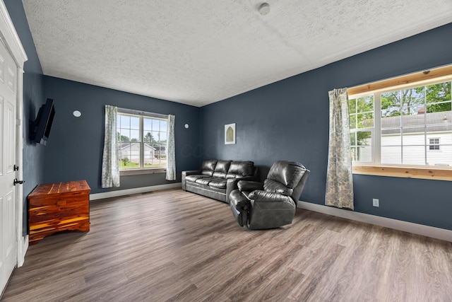 972 Weiant Ave, Newark, OH 43055 - living room with a textured ceiling, healthy amount of natural light, and wood finished floors