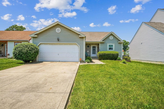 921 Harbinger Cir E, Columbus, OH 43213 - single story home with an attached garage, concrete driveway, a front yard, and roof with shingles