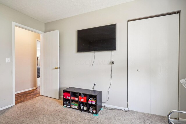 921 Harbinger Cir E, Columbus, OH 43213 - carpeted bedroom featuring baseboards and a closet