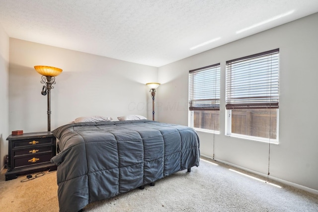 921 Harbinger Cir E, Columbus, OH 43213 - bedroom with carpet and a textured ceiling