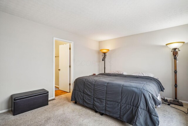 921 Harbinger Cir E, Columbus, OH 43213 - carpeted bedroom with baseboards