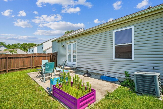 921 Harbinger Cir E, Columbus, OH 43213 - back of house with a patio and french doors