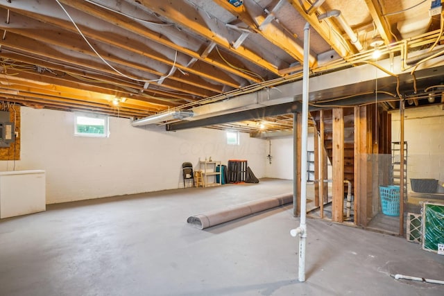 921 Harbinger Cir E, Columbus, OH 43213 - basement with electric panel and concrete block wall