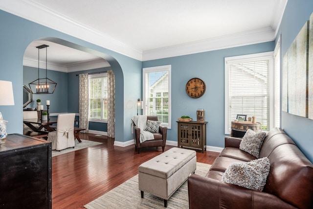 7212 New Albany Links Dr, New Albany, OH 43054 - living room featuring arched walkways, ornamental molding, wood finished floors, and a chandelier