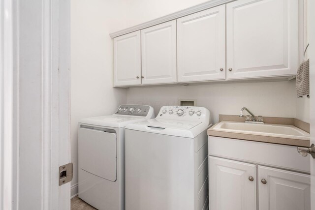7212 New Albany Links Dr, New Albany, OH 43054 - washroom with cabinet space and independent washer and dryer