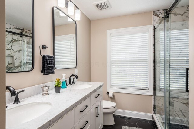 7212 New Albany Links Dr, New Albany, OH 43054 - full bathroom with tile patterned flooring, double vanity, plenty of natural light, and a marble finish shower