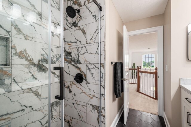 7212 New Albany Links Dr, New Albany, OH 43054 - full bathroom featuring a marble finish shower, vanity, and tile patterned flooring
