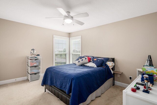 7212 New Albany Links Dr, New Albany, OH 43054 - bedroom featuring light carpet and a ceiling fan