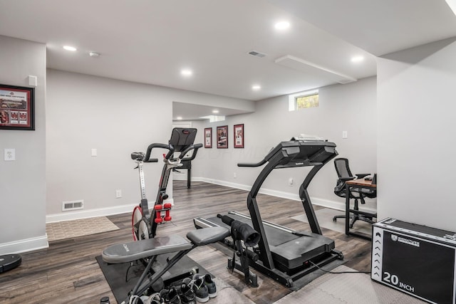 7212 New Albany Links Dr, New Albany, OH 43054 - workout room with wood finished floors and recessed lighting