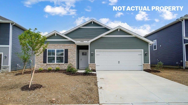 183 Badger Pass, Newark, OH 43055 - craftsman-style home featuring stone siding, concrete driveway, and an attached garage