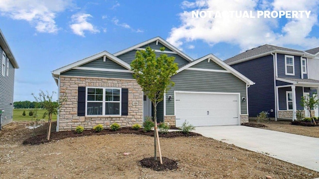 183 Badger Pass, Newark, OH 43055 - craftsman house featuring stone siding, driveway, and an attached garage