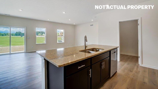 183 Badger Pass, Newark, OH 43055 - kitchen featuring dishwasher, light wood-style floors, open floor plan, light stone counters, and recessed lighting