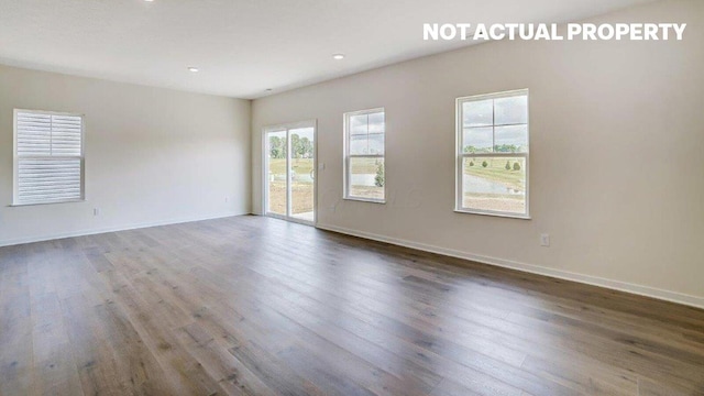183 Badger Pass, Newark, OH 43055 - empty room with wood finished floors and recessed lighting