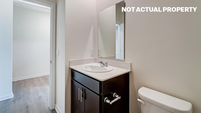183 Badger Pass, Newark, OH 43055 - bathroom with vanity and wood finished floors