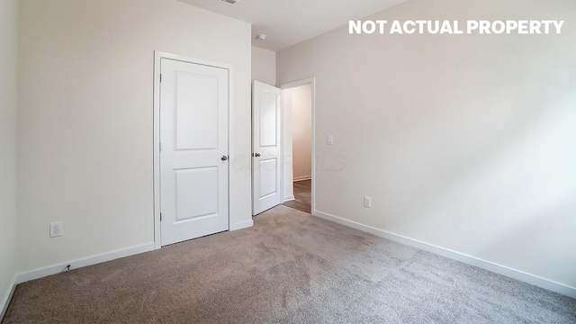 183 Badger Pass, Newark, OH 43055 - unfurnished bedroom with carpet floors and baseboards