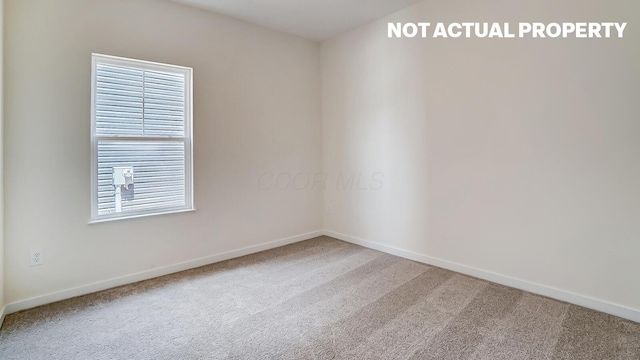 183 Badger Pass, Newark, OH 43055 - carpeted spare room with baseboards